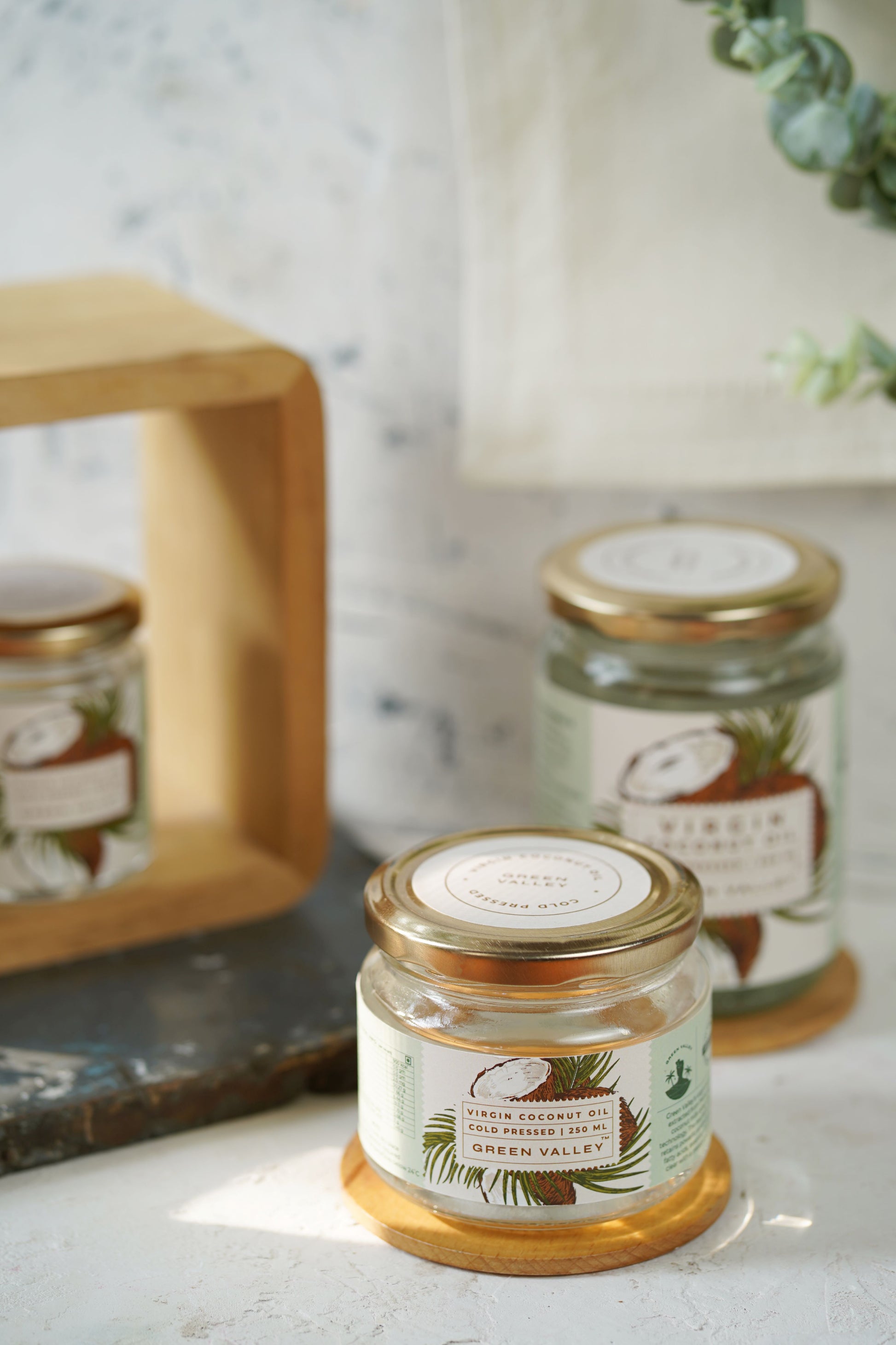 small glass jar Virgin Coconut Oil